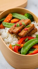 Homemade Thai vegetarian Buddha bowl with sweet chili tempeh, fresh vegetables, and wholesome ingredients, a delicious healthy meal for light eaters, weight watchers