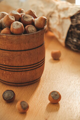 Discovering the beauty of wooden vessels filled with nuts in a rustic setting