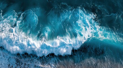 Obraz premium The sea water is very clear, abstract aerial view background of blue waves
