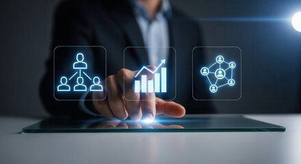Business professional interacting with digital interface displaying graphs and network icons, illustrating data analysis and connectivity in modern technology environment