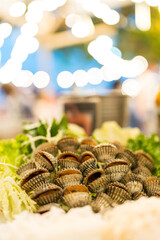 Boiled cockles eaten with tasty sauce, Thai seafood