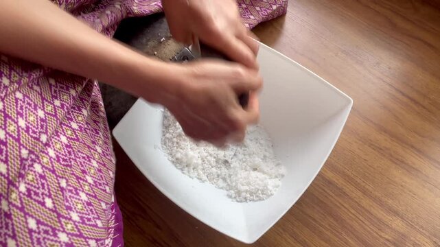 Thai Traditional Coconut Grating with Wooden Rabbit Tool
