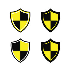 Four yellow and black shield icons arranged in a twobytwo grid, isolated on a white background technology background