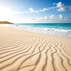 Sunny beach, rippled sand, tranquil ocean
