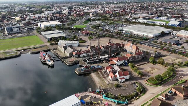 Aerial drone video Hartlepool marina harbour port beach coastal town County Durham North East England UK HMS Trincomalee
