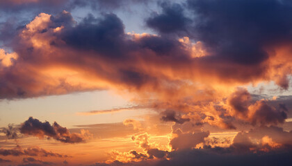 Majestic Sunset Clouds Illuminated By Golden Light Creating A Serene Atmosphere In The Sky