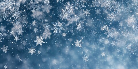 Falling snowflakes against a deep blue background (1)