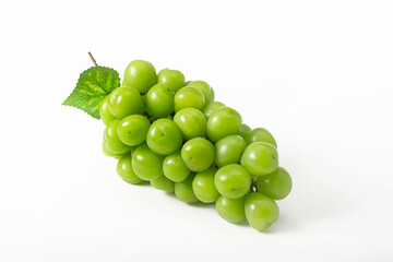 A bunch of fresh green grapes with large berries on a white background. Isolated