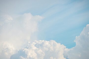 White fluffy cumulus clouds podium on blue sky with empty space background.Beauty cosmetic product placement pedestal present promotion minimal stand display,dreamy concept.