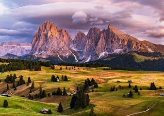 The UNESCO site Seiser Alm or Alpe di Siusi the Dolomite plateau and the largest high-elevation Alpine meadow in Europe located in Italy's South Tyrol province in the Dolomites in autumn sunset.