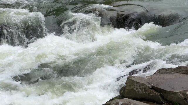 Water flow in Probiy waterfall on Prut River in Carpathians