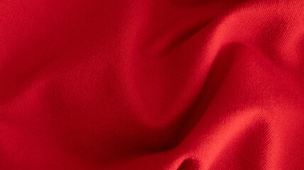 Red Fabric Texture — Close-Up of Soft Textile with Folds and Highlights. Ideal for banners and...