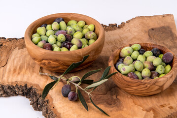 Olive harmony: A rustic still life of nature's bounty in handcrafted bowls