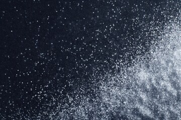 Dynamic Water Spray - Sparkling Droplets Erupting from Dark Ocean Surface, Creating Abstract Texture and Motion.