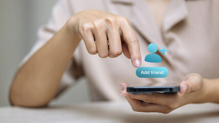 Hand Tapping Add Friend Button on Smartphone for Social Network Connection