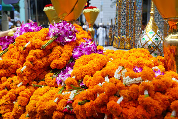 Marigold garlands offered for worship at the Erawan Shrine in Bangkok, Thailand.