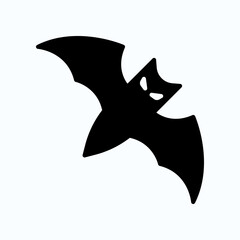 Silhouette Of A Flying Bat In Black Against Light Background For Halloween And Night Themes