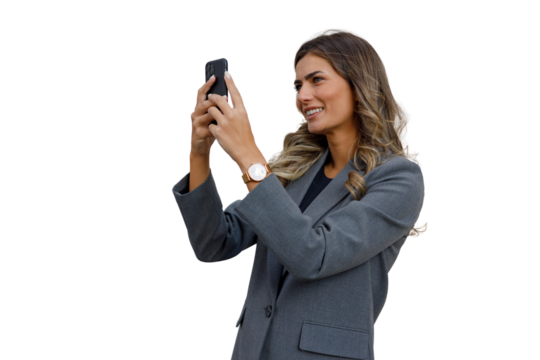 Businesswoman taking selfie with smartphone, smiling, creating social media content, isolated on transparent background - Powered by Adobe