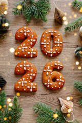 Gingerbread 2026 Cookies Forming The Year On Wooden Table With Pine Branches And Festive Decor