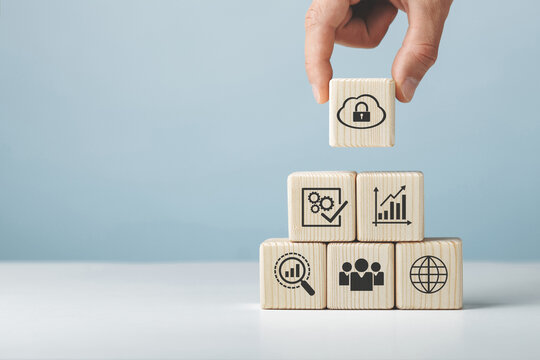 Assembled wooden cubes on the topic of cyber security leadership in business and life