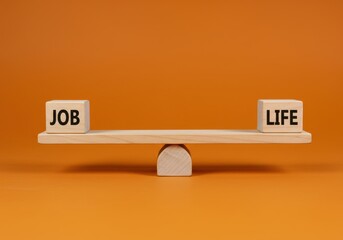 A wooden seesaw balancing job and life on an orange background