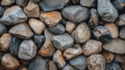 Natural river rocks creating a textured background pattern