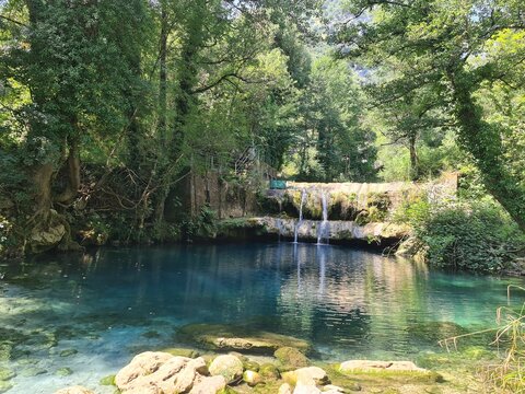 Waterfall Capelli di Venere, small mountainside cascade surrounded by vegetation, close to a ruined mill, Casaletto Spartano, Province of Salerno, Italy