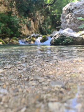 Waterfall Capelli di Venere, small mountainside cascade surrounded by vegetation, close to a ruined mill, Casaletto Spartano, Province of Salerno, Italy