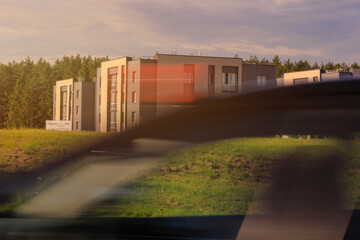 Obraz premium The effect of speed on the road and blurred objects. Roadside view, road and landscape, forest and field.