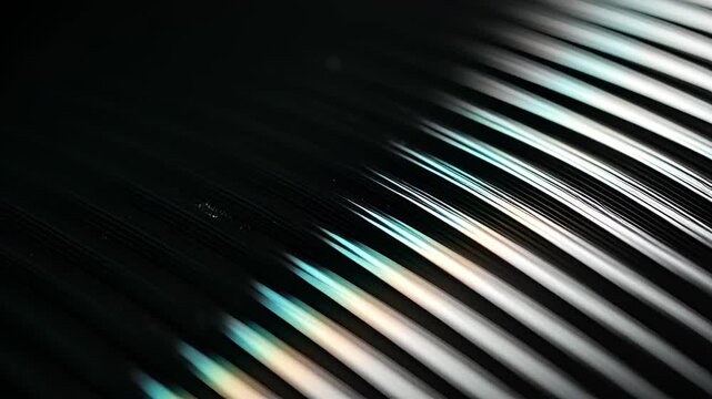 Sleek metal rods glimmering in the dark video footage showing depth and movement perfect for industrial design projects or abstract visuals