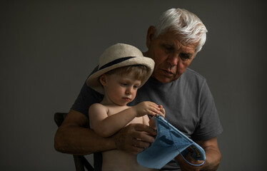 Portrait of Grandfather and Grandson in Soft Natural Light