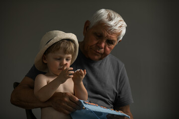 Portrait of Grandfather and Grandson in Soft Natural Light