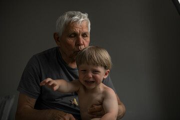 Portrait of Grandfather and Grandson in Soft Natural Light