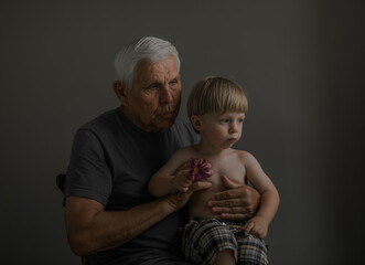 Portrait of Grandfather and Grandson in Soft Natural Light