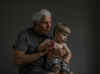 Portrait of Grandfather and Grandson in Soft Natural Light