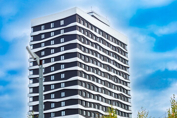 Fototapeta premium A modern, comfortable home with a futuristic façade, gated community, playground, video surveillance, and well-developed infrastructure.