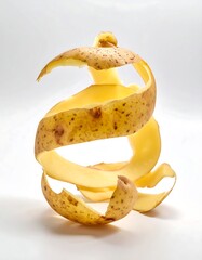 Spiral potato peel on white background