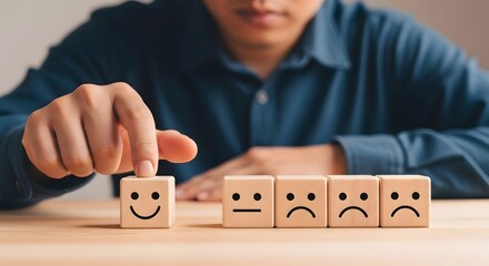 Obraz premium Customer satisfaction rating scale concept with wooden blocks and happy face feedback survey