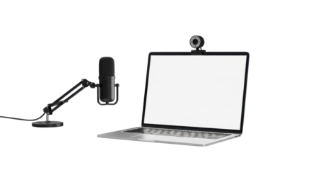 A laptop with a blank screen and a microphone set up for podcasting or recording.