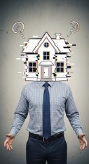 Surreal businessman with house for head symbolizes home ownership and real estate dreams