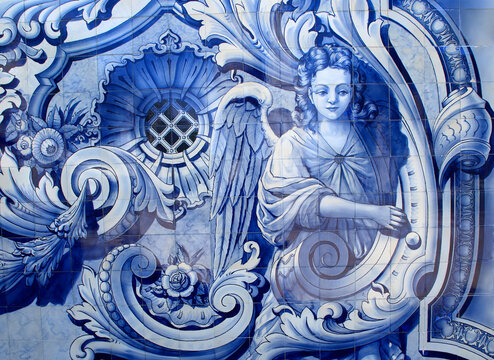 Portugal, Douro Region, Lamego. Typical historica blue and white ceramic azulejo tiles on exterior wall, depicting an angel. (historical images - no copyright issues)