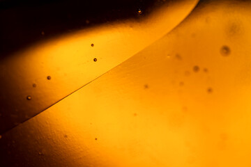 The surface of the cosmetic product has bubbles. blurred background. soft focus