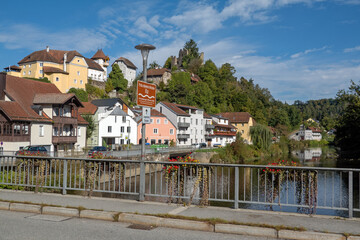 Obraz premium Hals, Bavaria, Germany: bridge over the Ilz river, with name sign, on a sunny day in summer, just upstream of the confluence with the Danube and Inn rivers in Passau