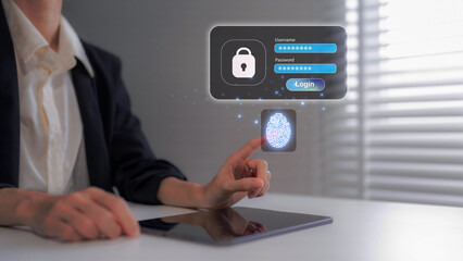 Professional user utilizes biometric fingerprint login authentication for secure digital access on...