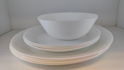 stack of white bowls
