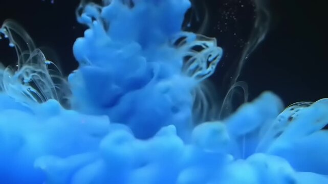 Blue Ink Exploding in Water.