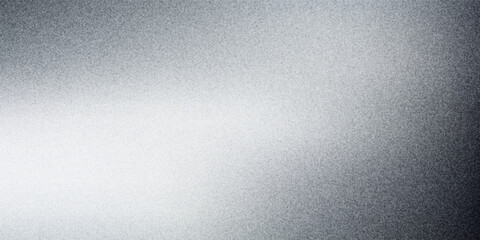 Light is reflecting on a grainy metallic surface