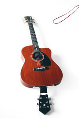 A Guitar Acoustic On A White Background