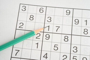 Sudoku puzzle, game to play for keep you brain younger for developing Alzheimer disease in senior patient.