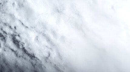 Obraz premium Soft White Clouds with Subtle Gray Hues against a Blue Sky